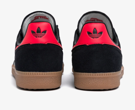 Rear view of adidas Palos Hills Black sneakers with red heel panels and black Trefoil logos