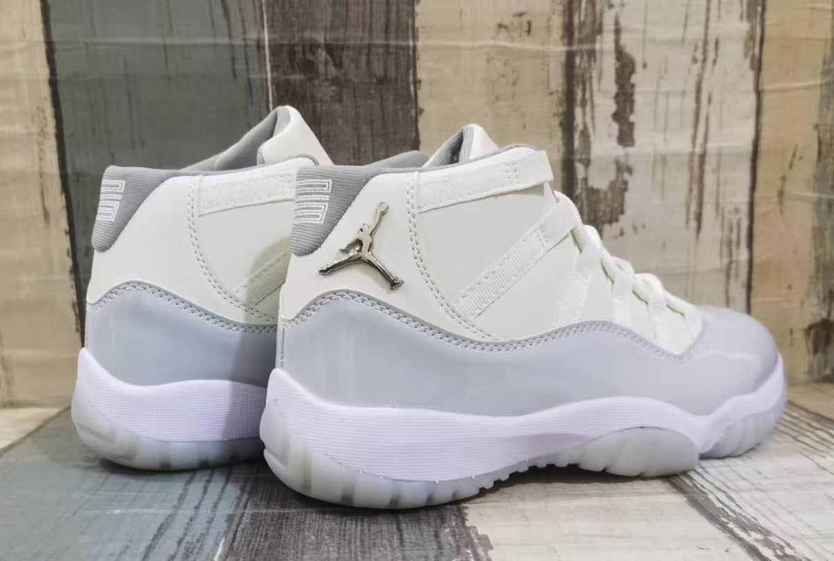 Air Jordan 11 Retro High-Top Sneakers – White & Grey